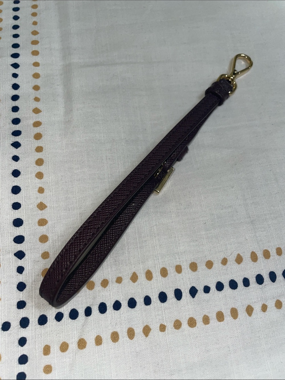 Prada burgundy Leather Wristlet Strap with Gold Hardware